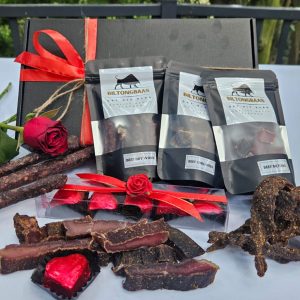 Premium Biltong & Chocolates Small gift box with 50g biltong, 50g droëwors, 50g chilli bites, and Geldhof heart hazelnut chocolate truffles.